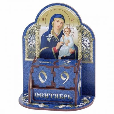 wooden desk perpetual calendar with Theotokos icon