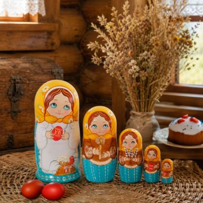 wooden painted paschal nesting doll family